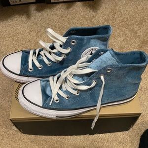 Teal and white women’s Converse